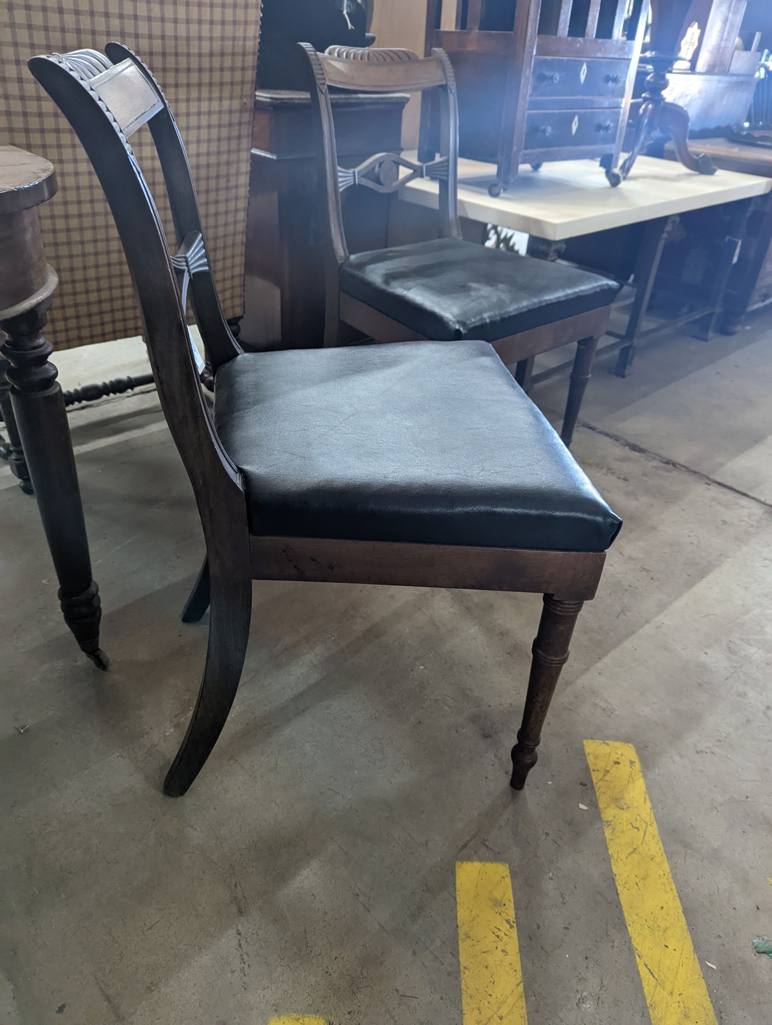 A pair of Regency mahogany dining chairs